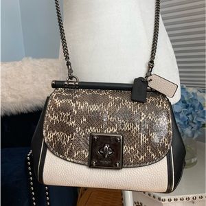 Coach black white and animal leather print bag with black leather strap